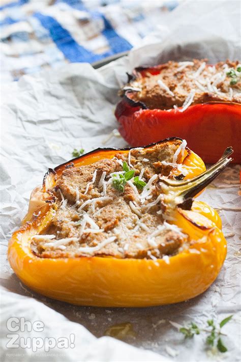 Stuffed Bell Peppers With Meat And Cheese On Them