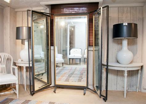 Velcro straps keep the mirror secure closed and travel handle makes it easy to carry. Triple Panel Full-Length Mirror at 1stdibs
