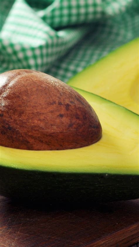 Download Healthy Green Flesh Avocado Fruit Portrait Wallpaper