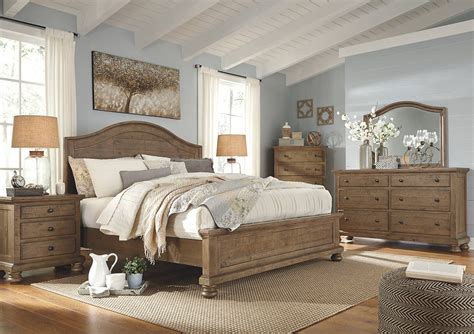 Trishley Light Brown Wood Bedroom Set With Matching