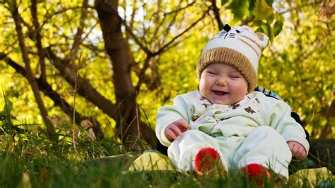 Smiling Cute Baby Boy Behind The Forest Hd Wallpaper Cute Little Babies