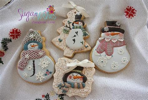 Fancy Snowmen Cookies With Hats Scarfs And Lacy Snowflakes Iced
