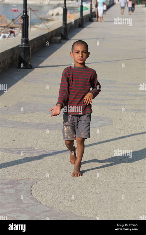 Begging Gypsy Boy In Albania Stock Photo Alamy
