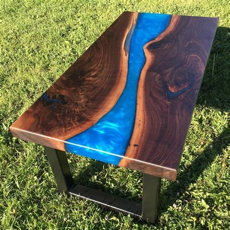 Provides unpolished elegance to your space. Black walnut resin coffee table is finally finished and ...