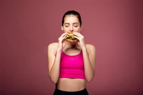 Hungry Girl Eating Cheeseburger Stock Image Image Of Holding Junk 166832525