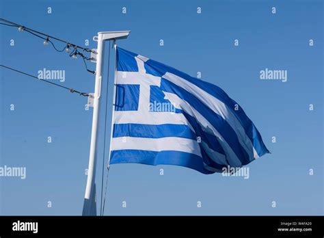 Greek Flag Waving Stock Photo Alamy
