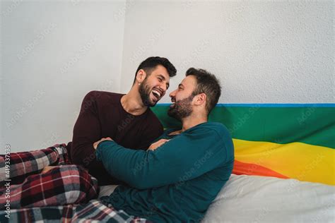happy gay couple having tender moments in bedroom homosexual love relationship and gender