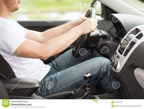 The sound hole is located at the bottom; Man Driving The Car With Manual Gearbox Stock Image ...