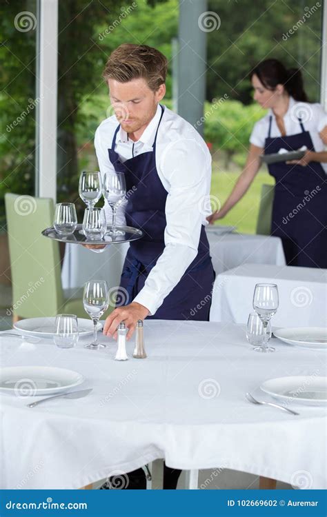 Waiter Setting Table At Restaurant Stock Photo Image Of Expertise