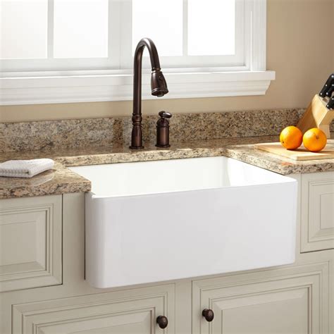 Apron sinks are also deep cut sinks that are designed to hold water and conveniently work with big to small sizes of pots and dishes. 26" Baldwin Fireclay Farmhouse Sink - Smooth Apron - White ...