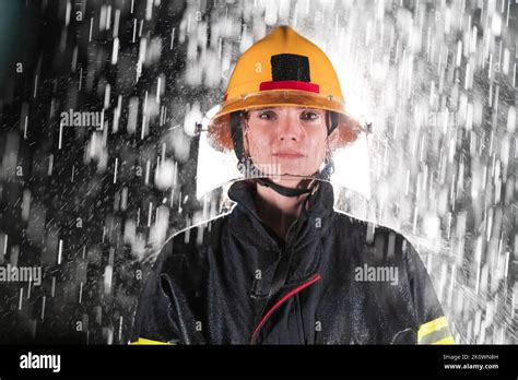 Portrait Of A Female Firefighter Standing And Walking Brave And