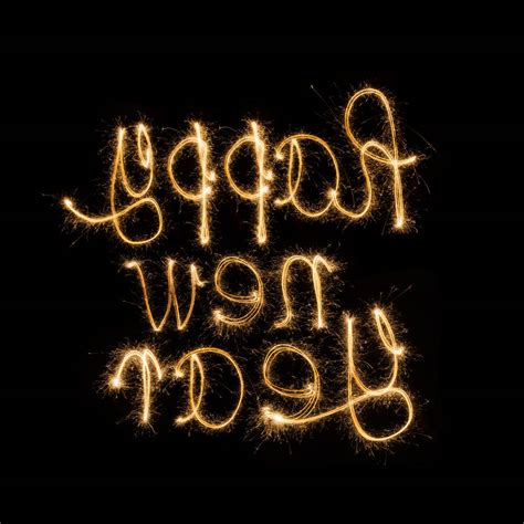 🥇 Image Of Happy New Year Written With Sparkle Firework 【free Photo