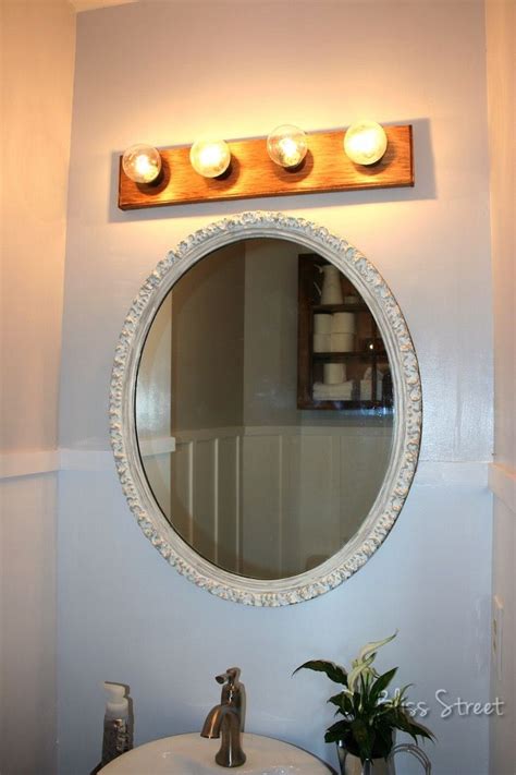 Replacing the vanity mirror and light in a bathroom is an easy improvement. Quick and Easy Bathroom Vanity Light Upgrade | Vanity ...