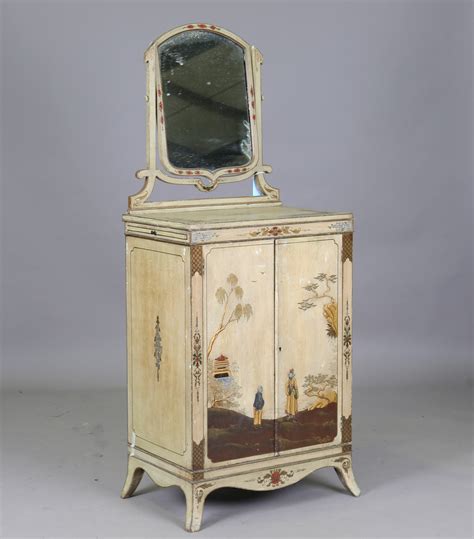 An Early 20th Century Green Painted Chinoiserie Dressing Cabinet