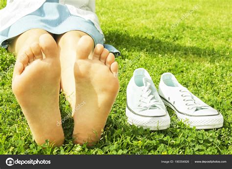 Female Bare Feet On Mawed Lawn Grass Babe Woman Resting Outdoors Barefoot Take A Break