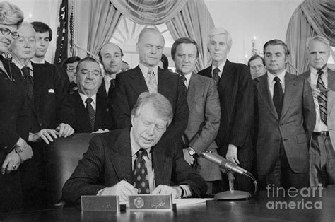 Jimmy Carter Signing Act By Bettmann