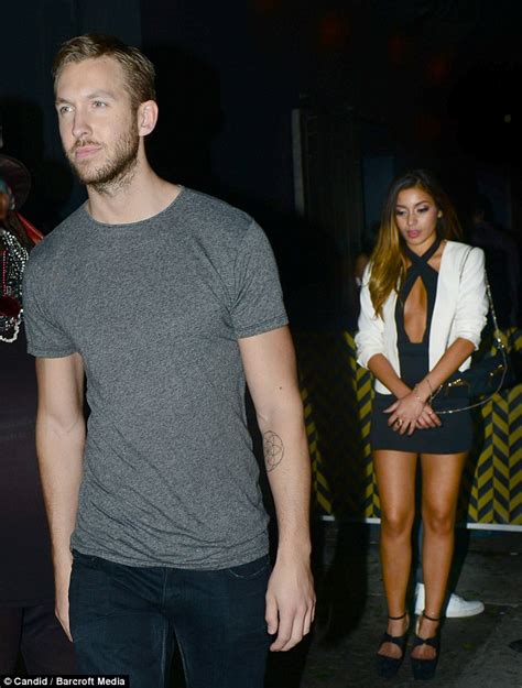 Calvin Harris Parties With Mystery Woman While Rita Ora Enjoys Mexican Getaway Daily Mail Online