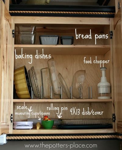 Racks to allow easy acces to baking dishes in a cabinet (via kevinandamanda) when it comes to the storage organization you need to think about a lot of things including organizing your baking dishes. Tips to a more organized kitchen: cabinets & drawers
