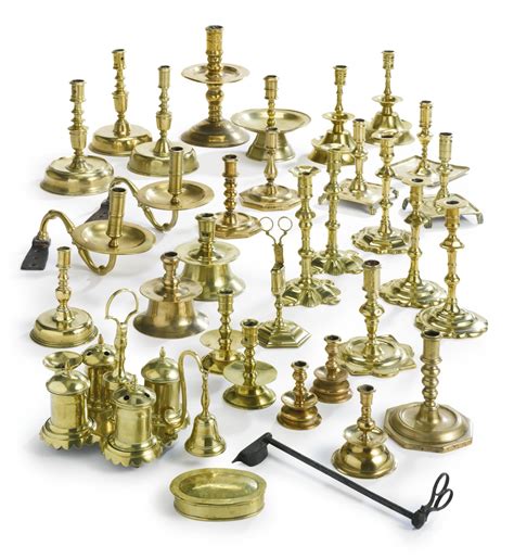 165 An Assorted Group Of Brass Candlesticks And Other Lighting