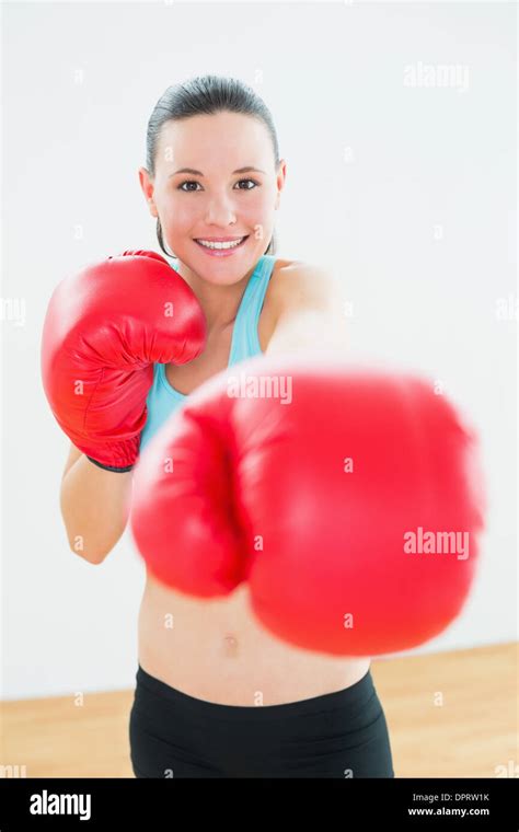 Beautiful Woman In Red Boxing Gloves At Fitness Studio Stock Photo Alamy