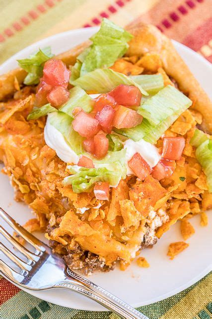 Crush the entire bag of doritos and cover the bottom of the dish. Doritos Taco Bake - OMG! SO good! crescent rolls topped ...
