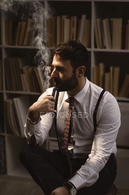 Portrait Of Bearded Man Smoking Pipe — 30s Shirt And Tie Stock Photo