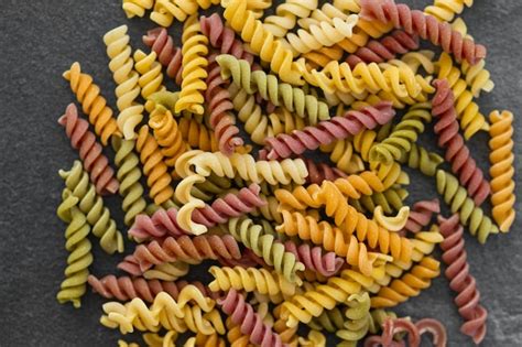 Premium Photo Colorful Fusilli Pasta Multicolor Spiral Macaroni Closeup
