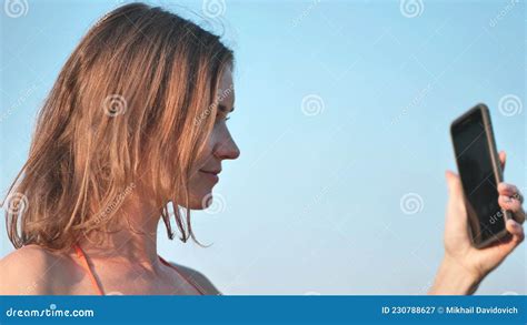 The Girl Takes A Selfie On The City Beach Stock Image Image Of People Beauty 230788627