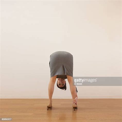 Bending Over In Skirt Photos Et Images De Collection Getty Images