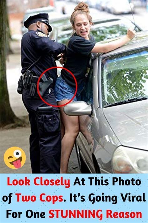 a police officer standing next to a woman in front of a car with the caption look closely at