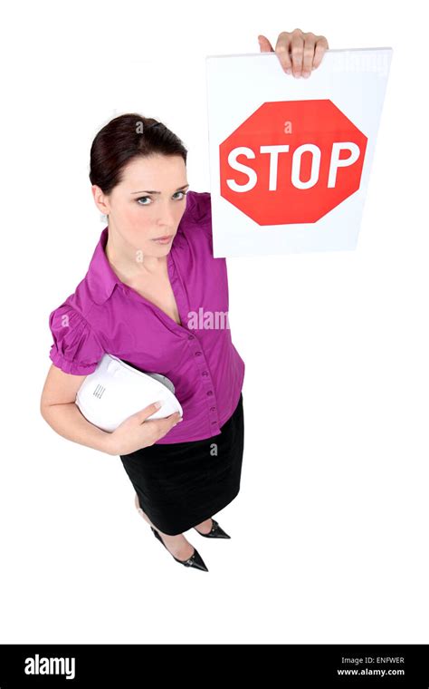 Businesswoman Holding Stop Sign Stock Photo Alamy