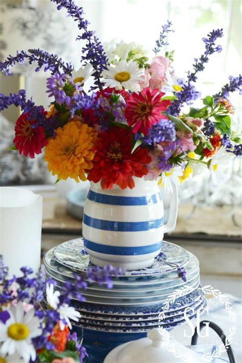 these diy flower arrangements will instantly brighten up any room easy floral arrangements