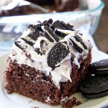This oreo dump cake with condensed milk is full of decadent deliciousness! Oreo Poke Cake - From a Box Cake Mix! - All Things Mamma