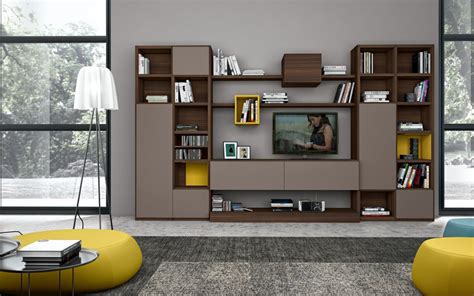 Line the office with a bookshelf unit or outfit the family room with a large tv stand. Modern Living Room Wall Units With Storage Inspiration