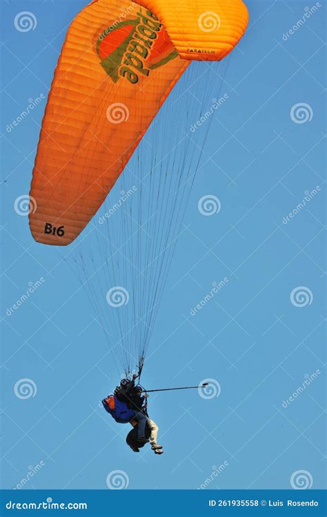 Paragliding Over The Ocean In The Bright Daylight Blue Sky Editorial