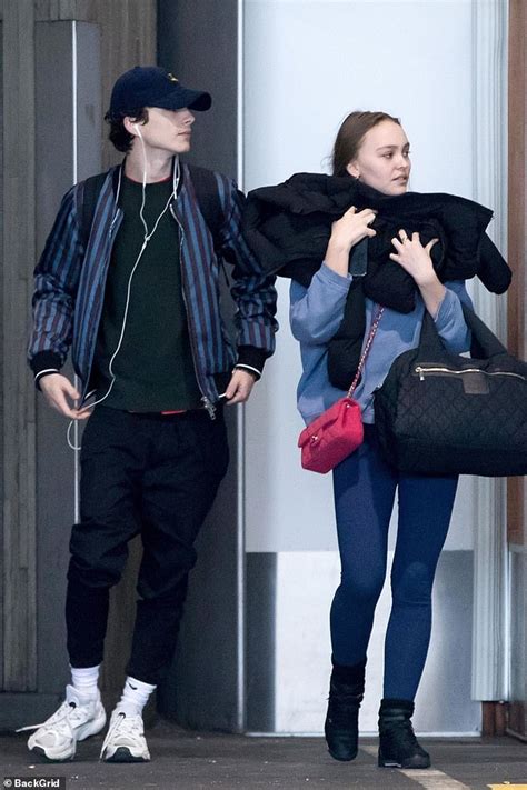 Lily Rose Depp Snuggles Up To Boyfriend Timothée Chalamet As They