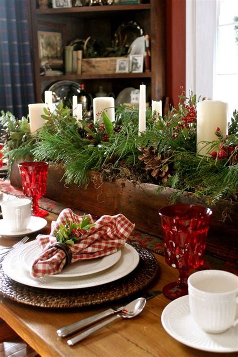 Tuck in a sprig of boxwood for an extra flourish. 24 Inspiring Rustic Christmas Table Settings - DigsDigs