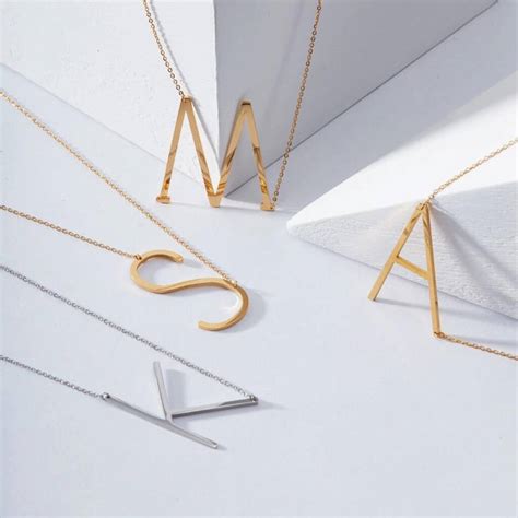 Alphabet necklace with pendant letter j color gold material 925 sterling silver, 23ct gold plated length 45 cm all our products are manufactured in g… Sideways Alphabet Necklace By Anna Lou Of London | notonthehighstreet.com