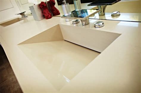 It has a variety of design patterns that can accent your bathroom vanity while providing the luxurious experience you're looking for. Caesarstone Quartz Vanity Top w/ Double Ramped Sinks