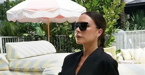 Victoria Beckham Puts On Leggy Display In Fishnets As She Sizzles In