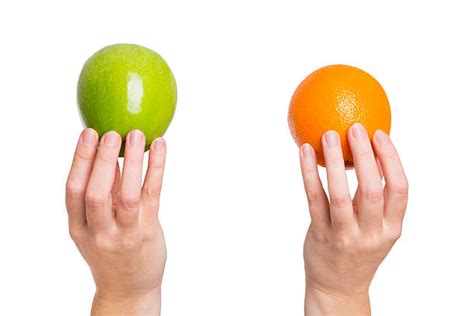 Best Comparing Apples And Oranges Stock Photos Pictures And Royalty Free