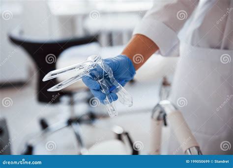 Close Up View Of Female Doctor Hands That Holds Speculum Instrument Stock Image Image Of Help