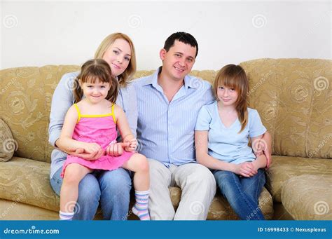 Mom Dad And Their Two Daughters Stock Photos Image 16998433