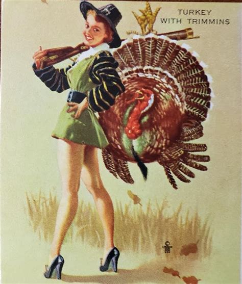 a woman holding a turkey in her right hand