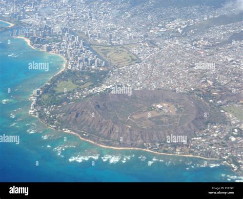 Aerial Of Diamond Head Crater Waikiki And Honolulu With Wave Bracking