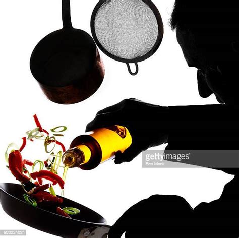 Chef Pouring Olive Oil Photos And Premium High Res Pictures Getty Images