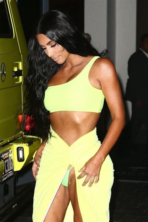 Kim Kardashian Matches Her Neon Outfit Underwear And Car In Miami
