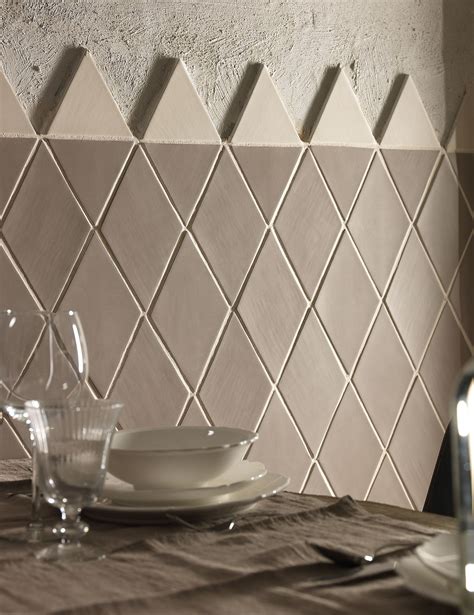 The water will go to the backsplash and drip to the dripping pan. Diamond and triangle shaped wall tiles from Solus Ceramics ...