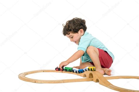 Niño Jugando Con El Tren — Foto De Stock © Noamarmonn 2232567