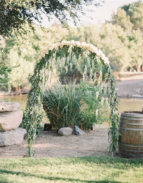 Light And Airy Blush Wedding Set Upon A Sparkling Pond With Images